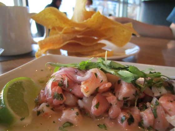 ceviche – ocean wise™ salmon, prawns, red onions,thai basil, mint, cilantro and nuoc cham dressing.